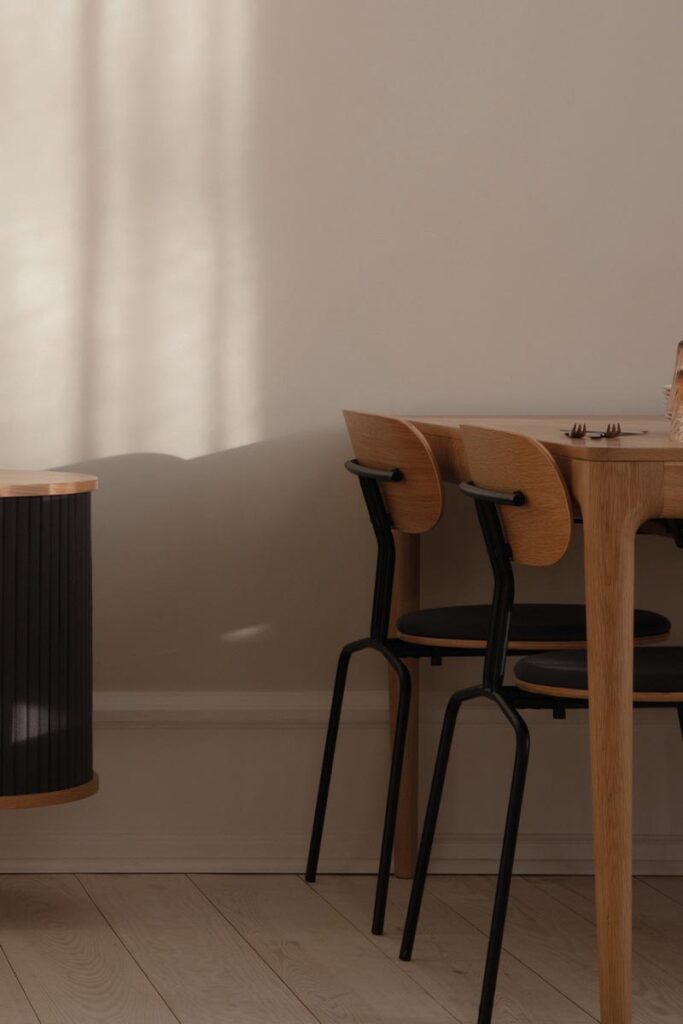 Wooden table and chairs by Umage